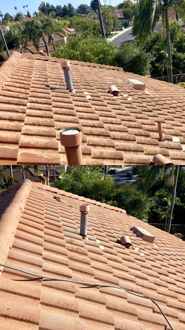 Brown tiled roof with pipes and wires.